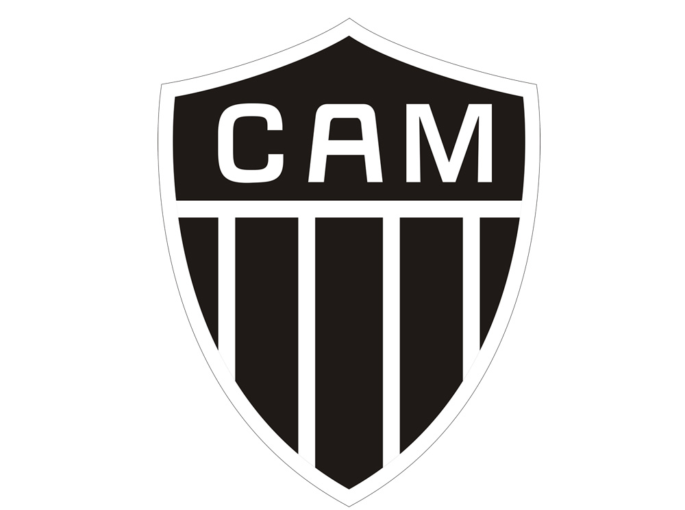 Jugadores de fútbol durante un partido nocturno en un estadio brasileño